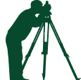 Illustration of land surveyor using total station equipment - M.B. Andurlekar & Associates